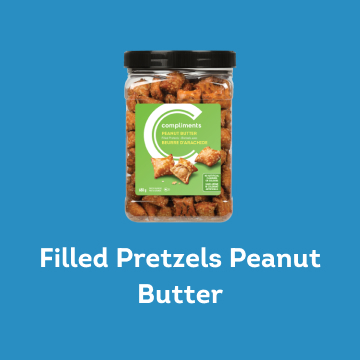 filled peanut butter pretzels in a clear tub